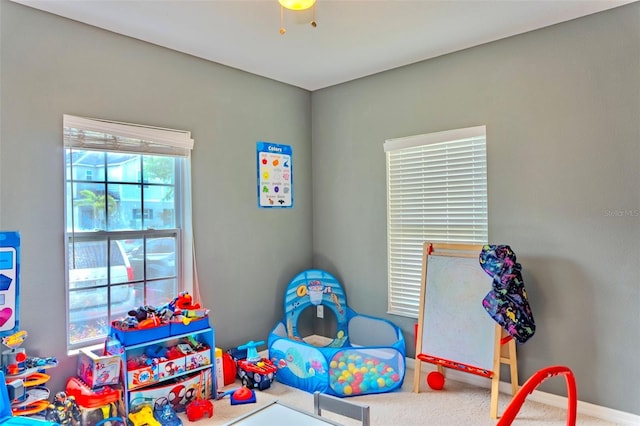 144 Primrose Dr, Davenport, FL 33837 - recreation room with baseboards and carpet floors