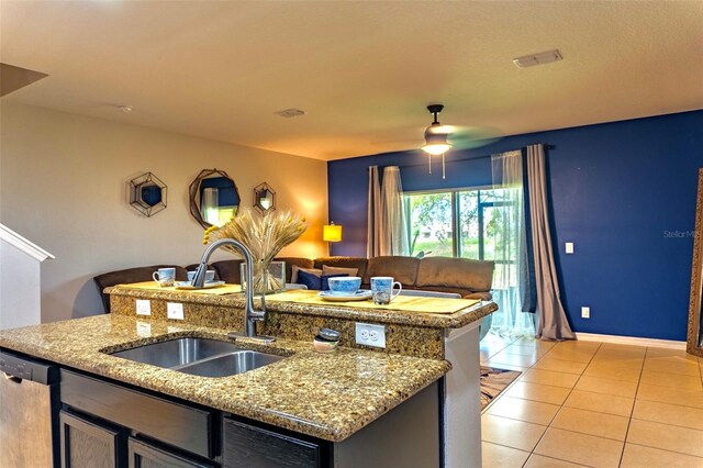 144 Primrose Dr, Davenport, FL 33837 - kitchen featuring a ceiling fan, a sink, open floor plan, stainless steel dishwasher, and light tile patterned floors