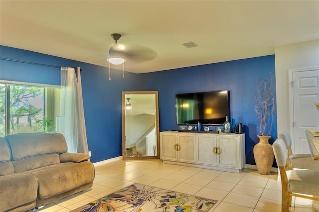 144 Primrose Dr, Davenport, FL 33837 - living area featuring baseboards, a ceiling fan, visible vents, and light tile patterned floors