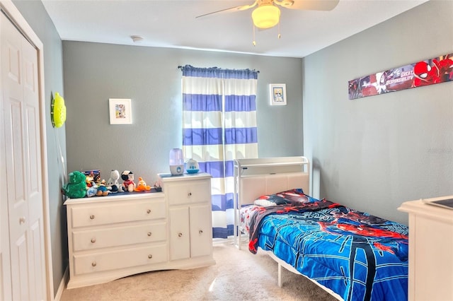 144 Primrose Dr, Davenport, FL 33837 - bedroom featuring a ceiling fan, carpet floors, and a closet