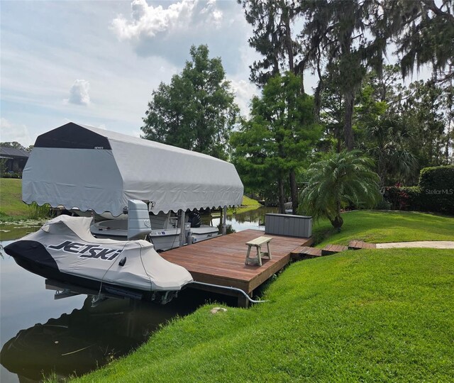 12030 Eagle Point Ct, Leesburg, FL 34788 - dock area featuring a yard and a water view