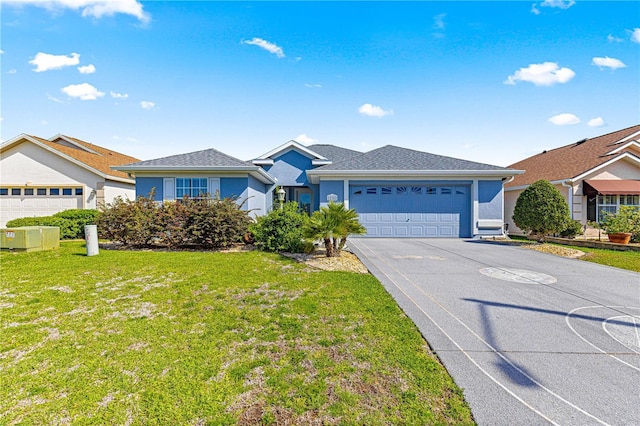 ranch-style house featuring a front lawn, driveway, stucco siding, and an attached garage