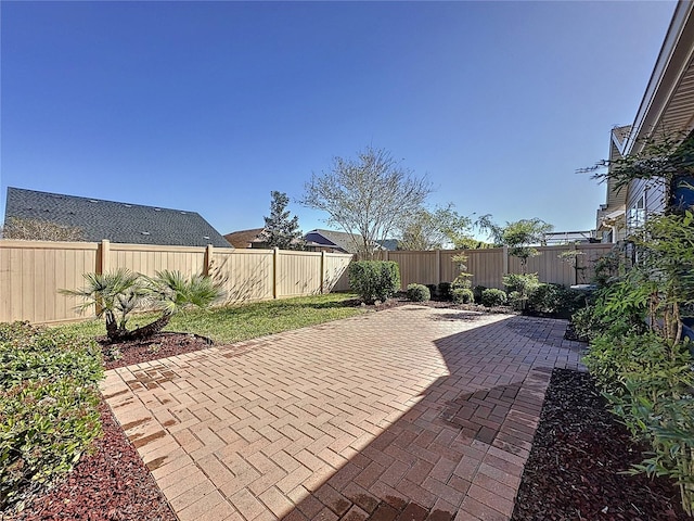 view of patio featuring a fenced backyard
