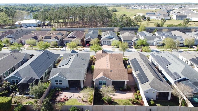 birds eye view of property with a residential view