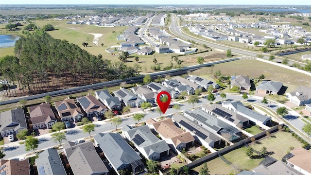 aerial view featuring a residential view and a water view