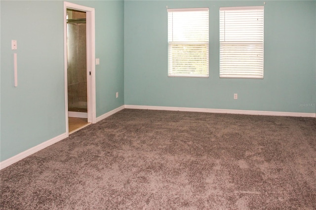 2572 Limerick Cir, Grand Island, FL 32735 - unfurnished room with carpet floors and baseboards