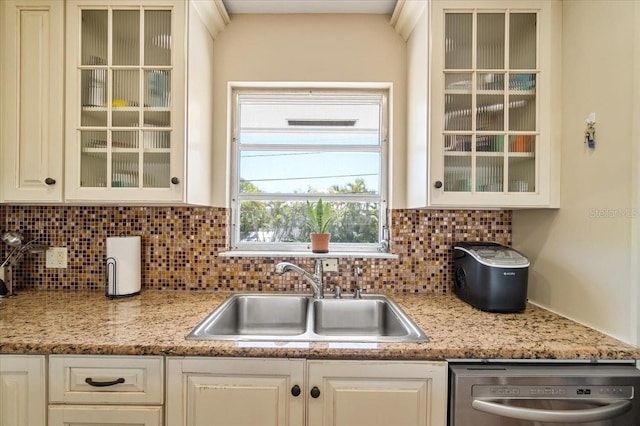 29051 Magnolia Ln, Big Pine Key, FL 33043 - kitchen featuring tasteful backsplash, stainless steel dishwasher, a sink, white cabinets, and glass insert cabinets