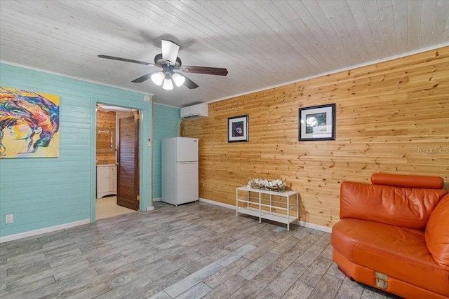 29051 Magnolia Ln, Big Pine Key, FL 33043 - unfurnished room featuring a wall mounted AC, wooden ceiling, wood finished floors, baseboards, and ceiling fan