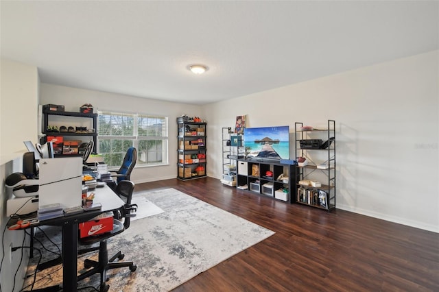 office area featuring wood finished floors and baseboards