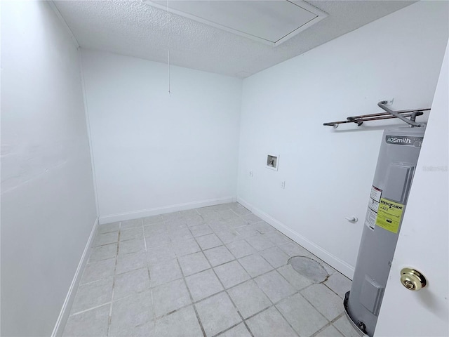 2423 Centennial Blvd, Leesburg, FL 34748 - clothes washing area with electric water heater, baseboards, a textured ceiling, laundry area, and washer hookup