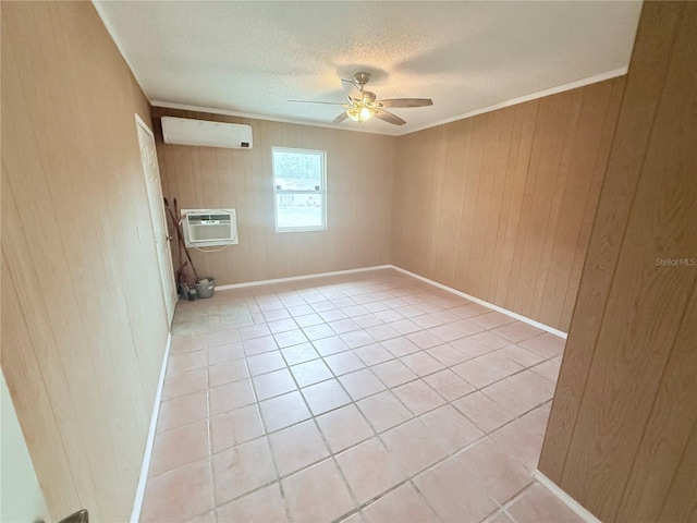 2423 Centennial Blvd, Leesburg, FL 34748 - spare room featuring light tile patterned flooring, a textured ceiling, a wall mounted air conditioner, an AC wall unit, and ceiling fan