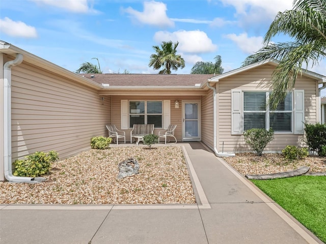 2111 Harston Trl, The Villages, FL 32162 - view of exterior entry with a porch