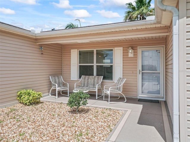 2111 Harston Trl, The Villages, FL 32162 - doorway to property with covered porch