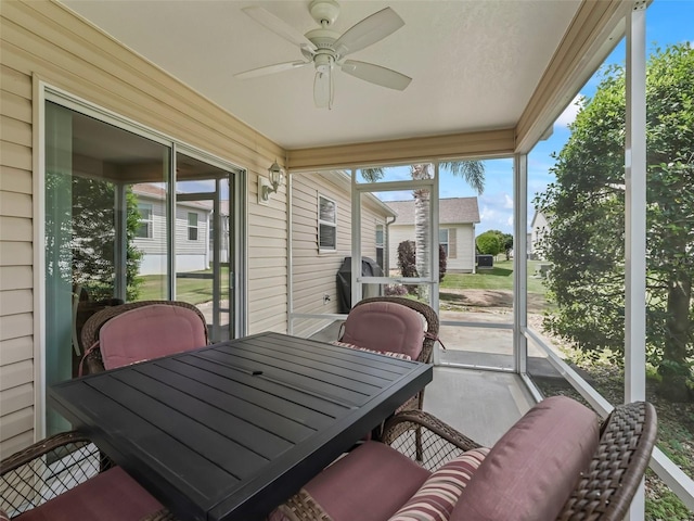 2111 Harston Trl, The Villages, FL 32162 - sunroom / solarium featuring a ceiling fan, outdoor dining area, and a wealth of natural light