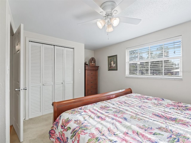 2376 Crk 444, Lake Panasoffkee, FL 33538 - bedroom with light colored carpet, a closet, and ceiling fan
