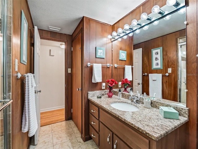 2376 Crk 444, Lake Panasoffkee, FL 33538 - full bathroom featuring vanity, a textured ceiling, wood walls, and visible vents