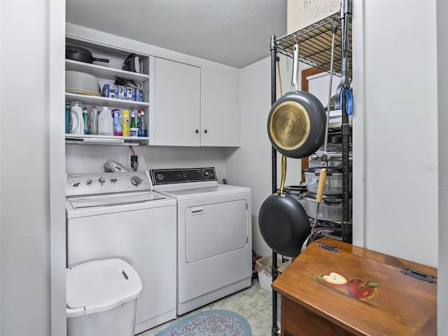 2376 Crk 444, Lake Panasoffkee, FL 33538 - washroom with washer and clothes dryer, cabinet space, and light tile patterned floors