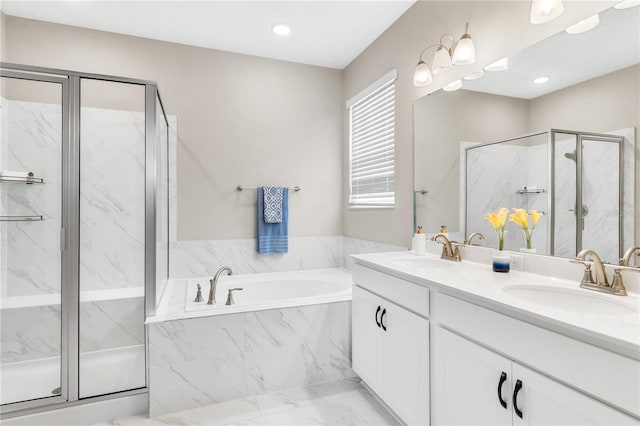 6003 Nightjar Ct, Okahumpka, FL 34762 - full bath featuring a marble finish shower, double vanity, a sink, and a bath