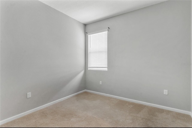 6003 Nightjar Ct, Okahumpka, FL 34762 - carpeted spare room with baseboards
