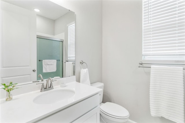 6003 Nightjar Ct, Okahumpka, FL 34762 - full bathroom with an enclosed shower, toilet, and vanity