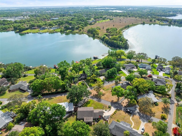 aerial view with a water view and a residential view
