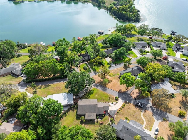 bird's eye view featuring a water view and a residential view