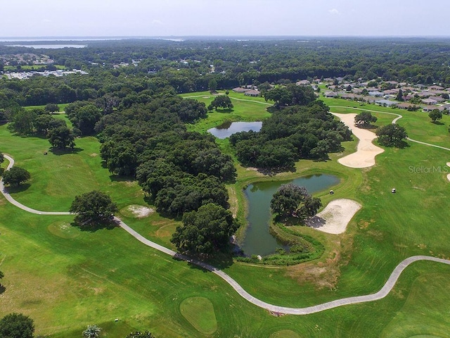 bird's eye view with golf course view and a water view