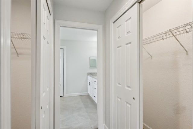 2575 SE 75th Blvd, Bushnell, FL 33513 - corridor featuring baseboards