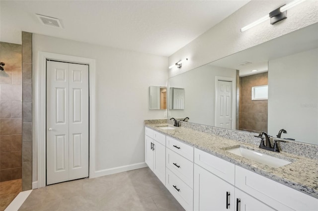 2575 SE 75th Blvd, Bushnell, FL 33513 - full bath featuring visible vents, a closet, a sink, and walk in shower