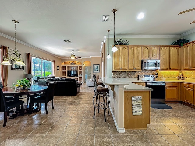 25545 Laurel Valley Rd, Leesburg, FL 34748 - kitchen with ceiling fan, visible vents, stainless steel appliances, and ornamental molding