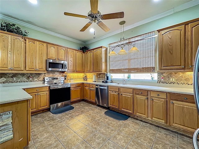 25545 Laurel Valley Rd, Leesburg, FL 34748 - kitchen with crown molding, decorative backsplash, a sink, ceiling fan, and appliances with stainless steel finishes