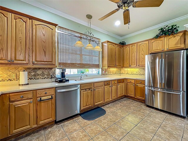 25545 Laurel Valley Rd, Leesburg, FL 34748 - kitchen featuring backsplash, ornamental molding, appliances with stainless steel finishes, and ceiling fan