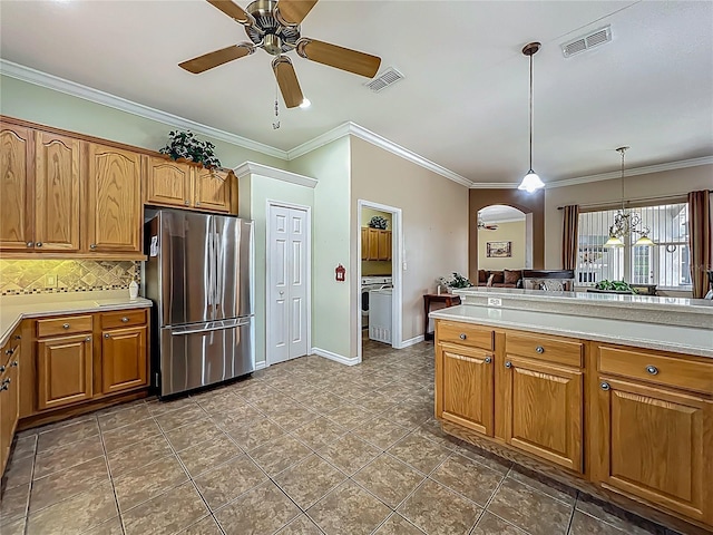 25545 Laurel Valley Rd, Leesburg, FL 34748 - kitchen featuring visible vents, a ceiling fan, arched walkways, and freestanding refrigerator