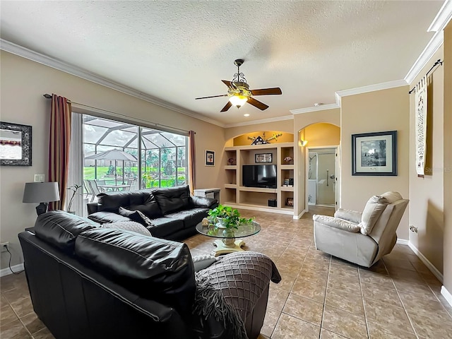 25545 Laurel Valley Rd, Leesburg, FL 34748 - living area with a textured ceiling, crown molding, a ceiling fan, arched walkways, and light tile patterned floors