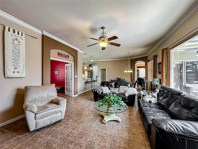 25545 Laurel Valley Rd, Leesburg, FL 34748 - tiled living area featuring arched walkways, ceiling fan, and ornamental molding