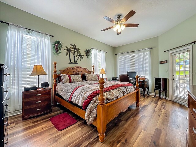 25545 Laurel Valley Rd, Leesburg, FL 34748 - bedroom featuring baseboards, access to outside, ceiling fan, and wood finished floors
