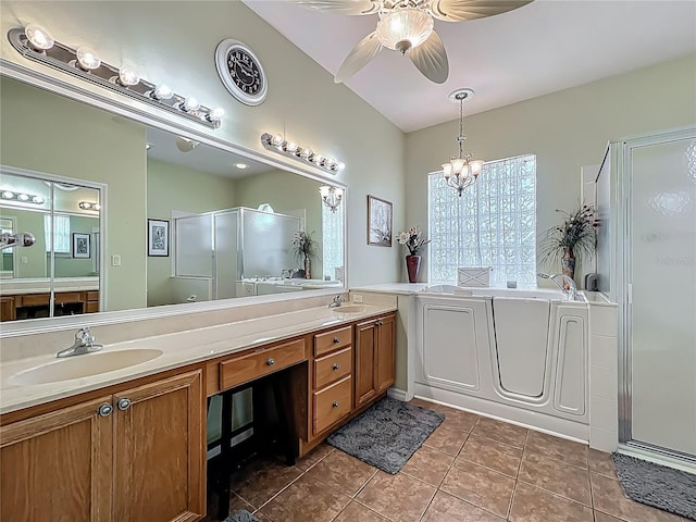 25545 Laurel Valley Rd, Leesburg, FL 34748 - full bath featuring ceiling fan with notable chandelier, a sink, a stall shower, double vanity, and a bath