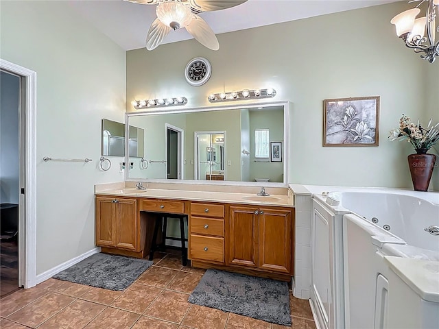 25545 Laurel Valley Rd, Leesburg, FL 34748 - full bath featuring ceiling fan with notable chandelier, double vanity, a sink, and tile patterned flooring