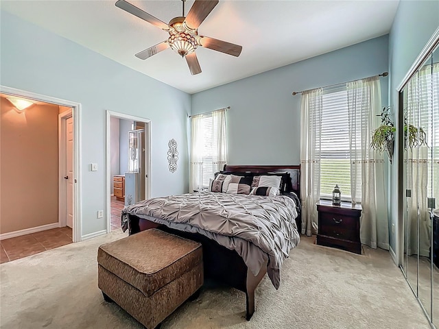 25545 Laurel Valley Rd, Leesburg, FL 34748 - carpeted bedroom with multiple windows, baseboards, and a ceiling fan