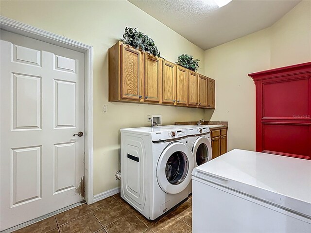 25545 Laurel Valley Rd, Leesburg, FL 34748 - washroom with independent washer and dryer, baseboards, dark tile patterned flooring, a sink, and cabinet space