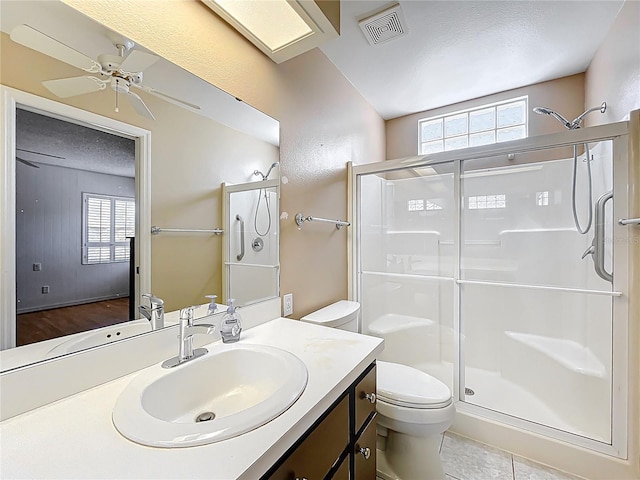 26823 Forest Hills St, Leesburg, FL 34788 - bathroom with a shower stall, a wealth of natural light, visible vents, and toilet