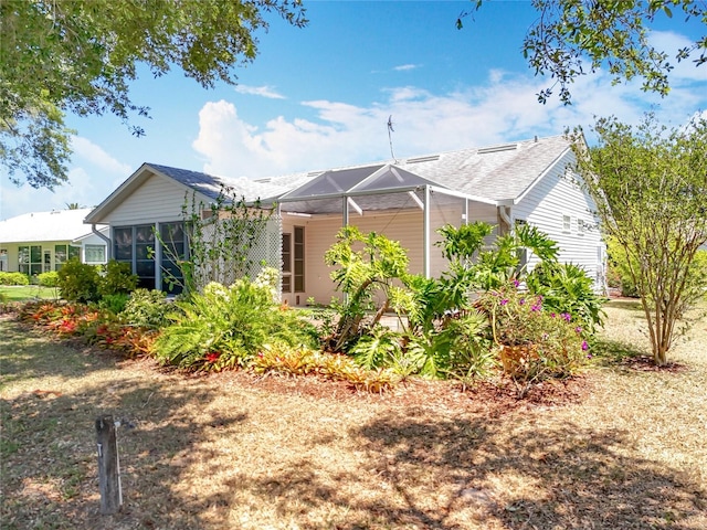 26823 Forest Hills St, Leesburg, FL 34788 - view of front of home with glass enclosure
