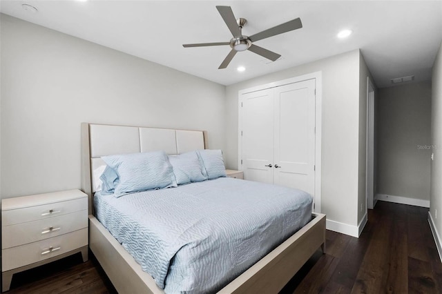 bedroom featuring dark wood finished floors, baseboards, visible vents, and recessed lighting