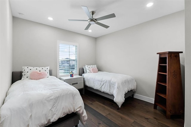 bedroom featuring baseboards, recessed lighting, dark wood-type flooring, and a ceiling fan