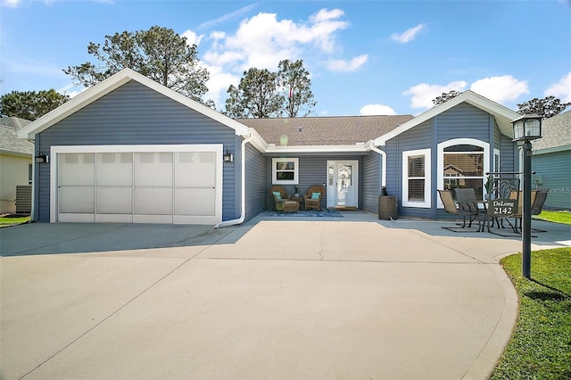 2142 Margarita Dr, The Villages, FL 32159 - ranch-style home featuring driveway, a garage, and cooling unit