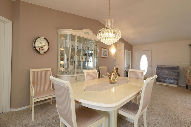 9948 SE 175th Pl, Summerfield, FL 34491 - dining space with carpet floors, an inviting chandelier, and vaulted ceiling