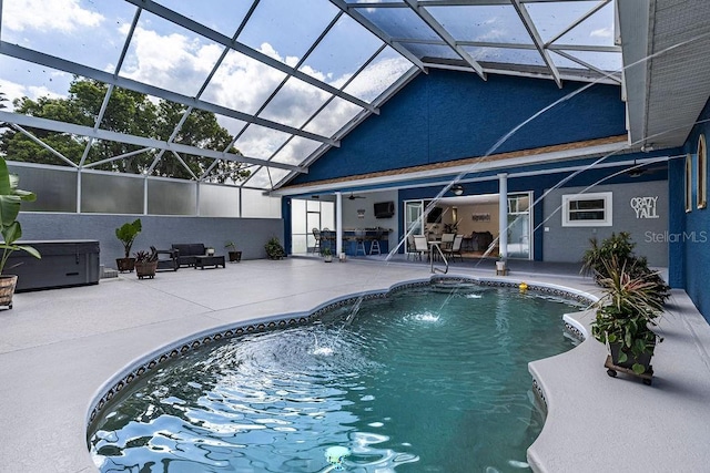 11619 Lane Park Rd, Tavares, FL 32778 - swimming pool featuring a patio area, a hot tub, ceiling fan, an outdoor living space, and glass enclosure
