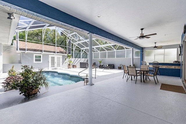 11619 Lane Park Rd, Tavares, FL 32778 - outdoor pool with french doors, a patio area, ceiling fan, and outdoor dining space