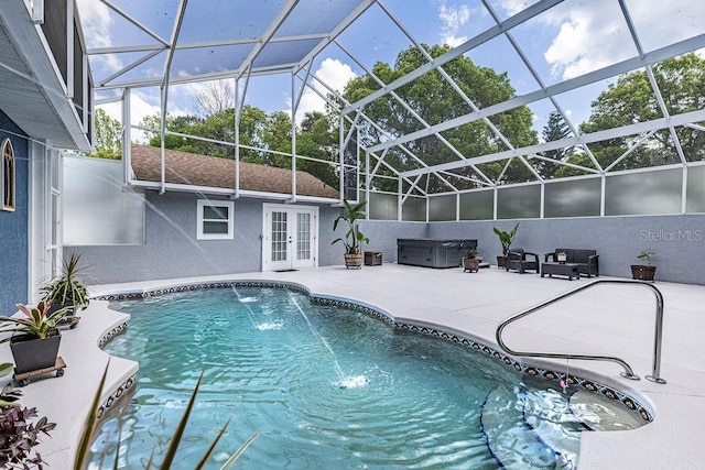 11619 Lane Park Rd, Tavares, FL 32778 - swimming pool featuring french doors, a hot tub, a patio area, and a lanai