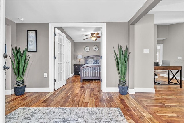 11619 Lane Park Rd, Tavares, FL 32778 - bedroom featuring an office area and wood finished floors